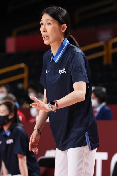 Team South Korea Head Coach Lee Moon-kyu signals to her team during the second half of their Women's Basketball Preliminary Round Group A game...