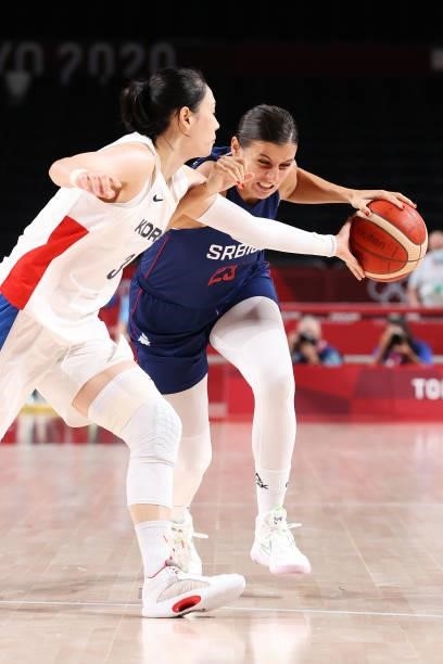 Ana Dabovic of Team Serbia drives to the basket against Leeseul Kang of Team South Korea during the second half of a Women's Basketball Preliminary...