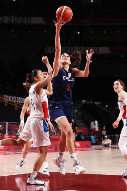 Sonja Vasic of Team Serbia drives to the basket against Jihyun Park of Team South Korea during the second half of a Women's Basketball Preliminary...