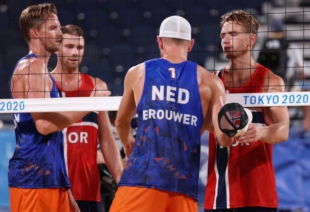 Anders Berntsen Mol and Christian Sandlie Sorum of Team Norway shake hands with Alexander Brouwer and Robert Meeuwsen of Team Netherlands after their...