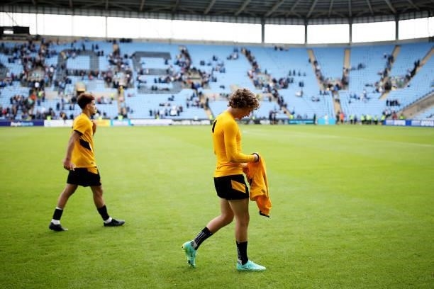 Fabio Silva of Wolverhampton Wanderers makes his way to give his shirt to a fan following the Pre-Season Friendly between Coventry City and...
