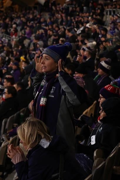 Fremantle spectators look on in the final seconds of the game during the round 20 AFL match between Fremantle Dockers and Richmond Tigers at Optus...