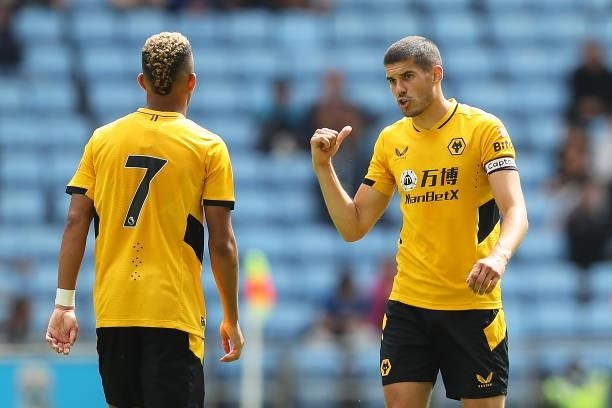Conor Coady of Wolverhampton Wanderers gives instructions to Chem Campbell during the Pre-Season Friendly between Coventry City and Wolverhampton...