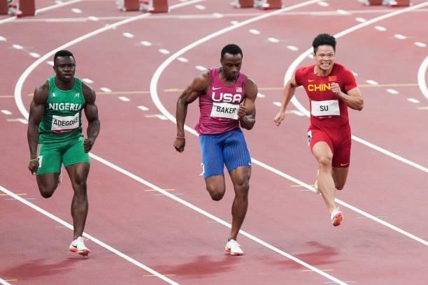 Enoch Adegoke of Nigeria, Ronnie Baker of United States and Su Bingtian of China compete in the Men's 100m Final on day nine of the Tokyo 2020...