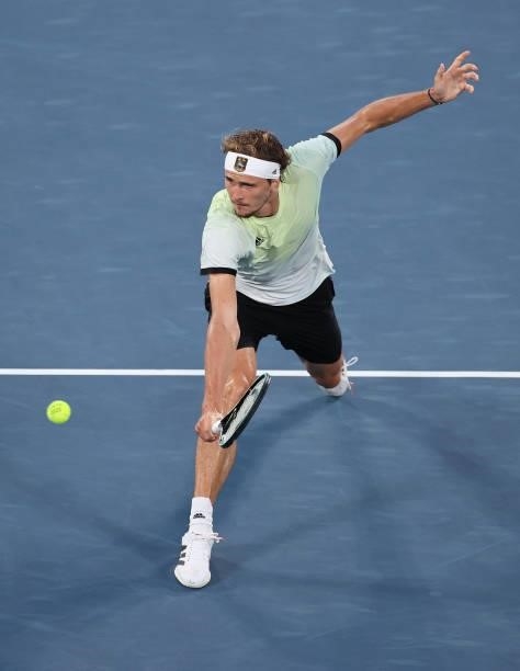 Alexander Zverev of Team Germany plays a backhand volley during his Men's Singles Gold Medal match against Karen Khachanov of Team ROC on day nine of...