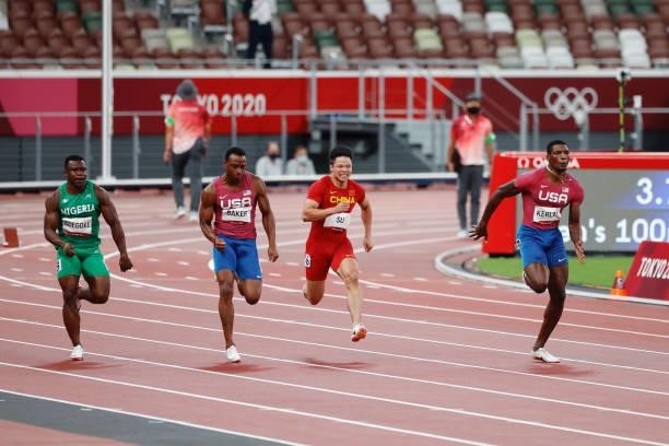 Enoch Adegoke of Nigeria, Ronnie Baker of United States, Su Bingtian of China and Fred Kerley of United States compete in the Men's 100m Final on day...