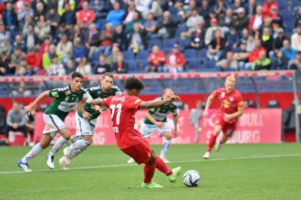 Karim Adeyemi of FC Red Bull Salzburg scores his team's fourth goal with a penalty kick during the Admiral Bundesliga match between FC Red Bull...