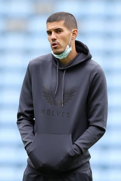Conor Coady of Wolverhampton Wanderers looks on as he inspects the pitch prior to the Pre-Season friendly match between Coventry City and...