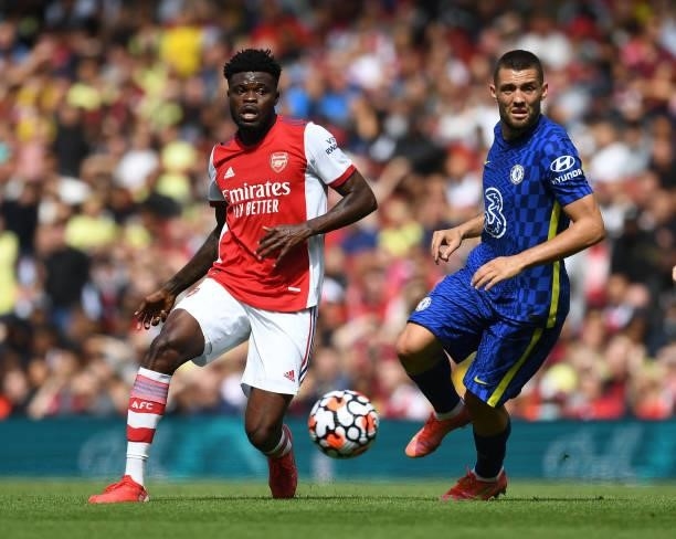 Thomas Partey of Arsenal takes on Mateo Kovacic of Chelsea during the pre season friendly between Arsenal and Chelsea at Emirates Stadium on August...