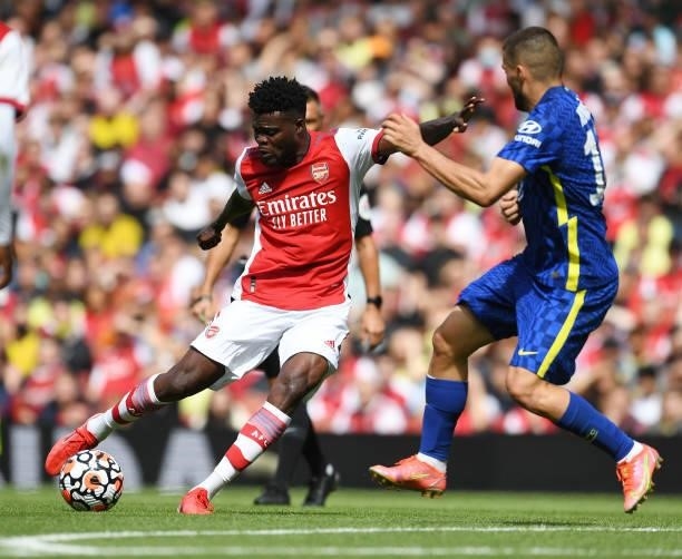 Thomas Partey of Arsenal takes on Mateo Kovacic of Chelsea during the pre season friendly between Arsenal and Chelsea at Emirates Stadium on August...