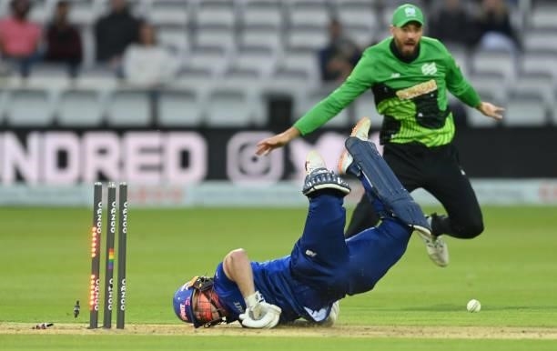Eoin Morgan of London Spirit is run out as James Vince of Southern Brave reacts during The Hundred match between London Spirit Men and Southern Brave...