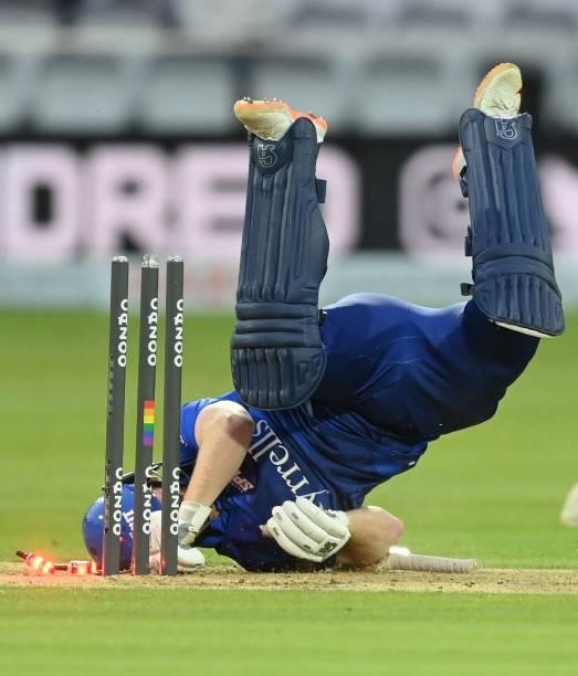 Eoin Morgan of London Spirit is run out as James Vince of Southern Brave reacts during The Hundred match between London Spirit Men and Southern Brave...