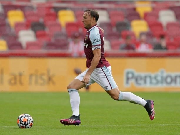 Mark Noble of West Ham United in action during the pre season friendly match between Brentford and West Ham United at Brentford Community Stadium on...