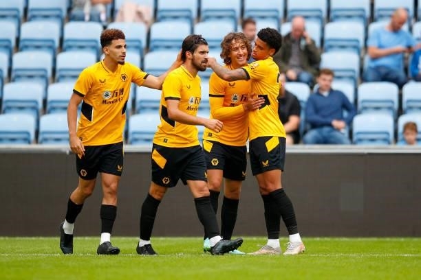 Fabio Silva of Wolverhampton Wanderers celebrates his goal with Rayan Ait-Nouri, Ruben Neves and Ki-Jana Hoever during the Pre-Season Friendly...
