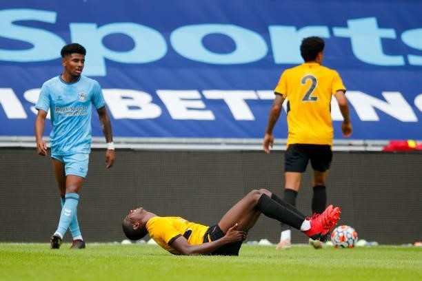 Yerson Mosquera of Wolverhampton Wanderers reacts to an injury during the Pre-Season Friendly between Coventry City and Wolverhampton Wanderers at...