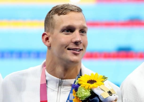 Gold Medalist Caeleb Dressel of USA during the medal ceremony of the Men's 50m Freestyle Final on day nine of the swimming competition of the Tokyo...
