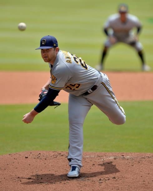 Brett Anderson of the Milwaukee Brewers pitches against the Atlanta Braves at Truist Park on August 1, 2021 in Atlanta, Georgia.