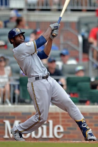 Lorenzo Cain of the Milwaukee Brewers bats during a game against the Atlanta Braves at Truist Park on August 1, 2021 in Atlanta, Georgia.