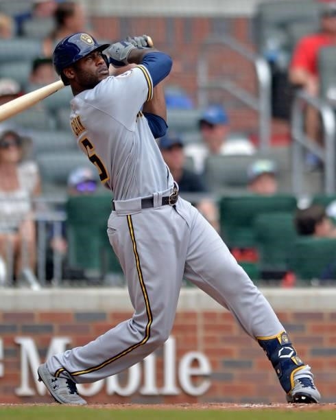 Lorenzo Cain of the Milwaukee Brewers bats during a game against the Atlanta Braves at Truist Park on August 1, 2021 in Atlanta, Georgia.
