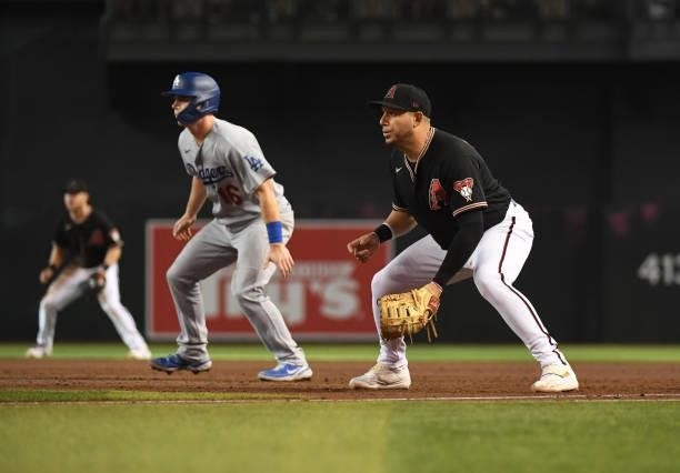 Asdrubal Cabrera of the Arizona Diamondbacks gets ready to make a play at first base against the Los Angeles Dodgers at Chase Field on July 31, 2021...