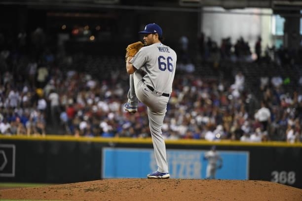 Mitch White of the Los Angeles Dodgers delivers a pitch against the Arizona Diamondbacks at Chase Field on July 31, 2021 in Phoenix, Arizona.