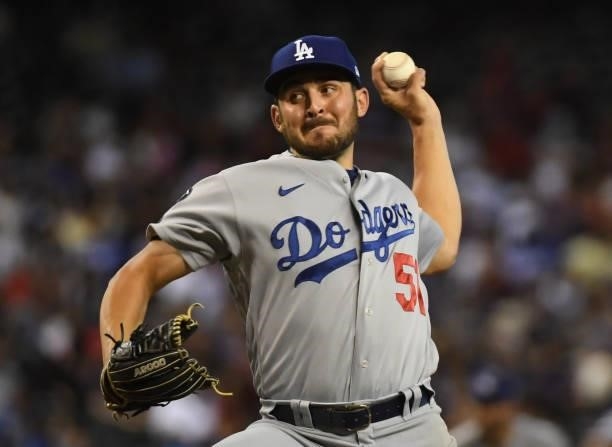 Alex Vesia of the Los Angeles Dodgers delivers a pitch against the Arizona Diamondbacks at Chase Field on July 31, 2021 in Phoenix, Arizona.