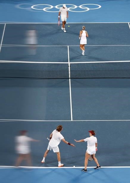 Andrey Rublev and Anastasia Pavlyuchenkova of Team ROC play Aslan Karatsev and Elena Vesnina of Team ROC during their Mixed Doubles Gold Medal match...