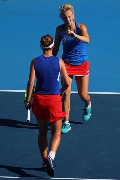 Katerina Siniakova and Barbora Krejcikova of Team Czech Republic celebrate after winning the first set against Belinda Bencic and Viktorija Golubic...