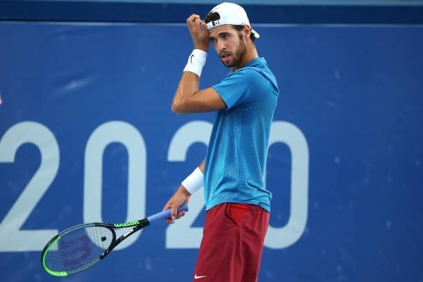 Karen Khachanov of Team Russian Olympic Committee reacts against Alexander Zverev of Team Germany during the Men's Singles Gold Medal Match on day...