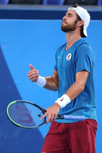 Karen Khachanov of Team Russian Olympic Committee reacts against Alexander Zverev of Team Germany during the Men's Singles Gold Medal Match on day...