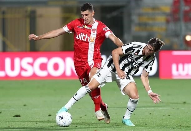 Fabio Miretti of Juventus FC competes for the ball with Mirko Maric of AC Monza during the AC Monza v Juventus FC - Trofeo Berlusconi at Stadio...