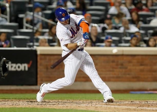 Pete Alonso of the New York Mets sixth inning base hit against the Cincinnati Reds at Citi Field on July 31, 2021 in New York City. The Mets defeated...