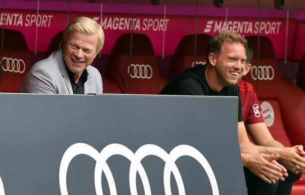 Coach Julian Nagelsmann of Bayern Muenchen and Oliver Kahn member of the FC Bayern Muenchen executive board at Allianz Arena on July 31, 2021 in...