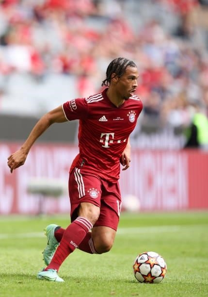 Leroy Sane of Bayern Muenchen runs with a ball at Allianz Arena on July 31, 2021 in Munich, Germany.