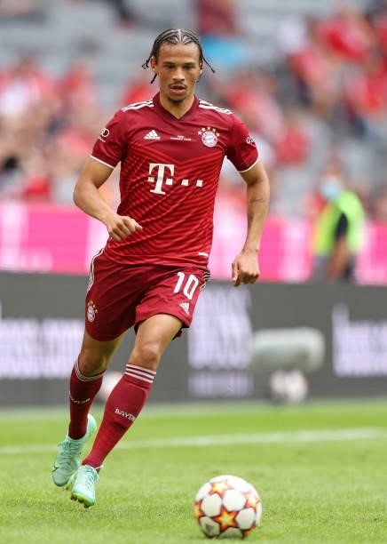 Leroy Sane of Bayern Muenchen runs with a ball at Allianz Arena on July 31, 2021 in Munich, Germany.