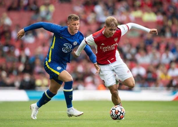 Emile Smith Rowe of Arsenal gets the better of Ross Barkley of Chelsea during the Pre Season Friendly between Arsenal and Chelsea at Emirates Stadium...