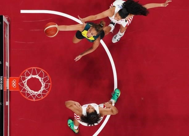 Leilani Mitchell of Team Australia drives to the basket against Isalys Quinones of Team Puerto Rico as Jennifer O'Neill looks on during the 2nd half...