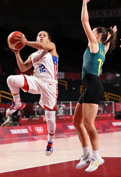 Dayshalee Salaman of Team Puerto Rico drives to the basket against Tess Lavey of Team Australia during the 2nd half of a Women's Basketball...