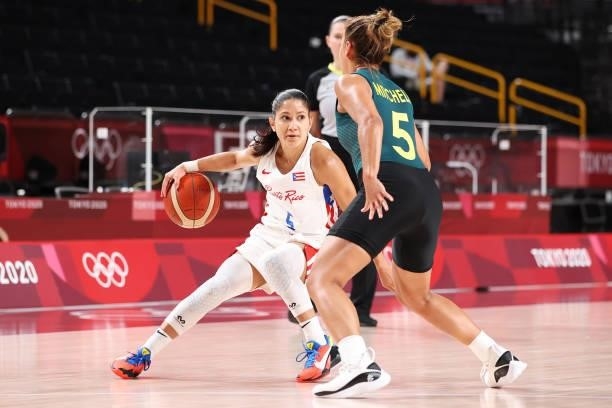 Pamela Rosado of Team Puerto Rico drives to the basket against Leilani Mitchell during the 2nd half of a Women's Basketball Preliminary Round Group C...