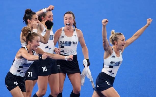 Team Great Britain celebrate victory in the Women's Quarterfinal match between Spain and Great Britain on day ten of the Tokyo 2020 Olympic Games at...