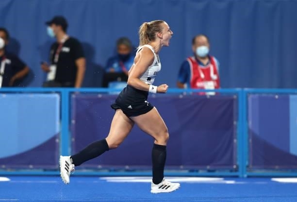 Hannah Martin of Team Great Britain celebrates scoring their team's second penalty in the penalty shootout during the Women's Quarterfinal match...