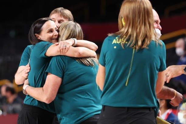 Team Australia Head Coach Sandy Brondello celebrates with her coaching staff after defeating Puerto Rico in their Women's Basketball Preliminary...
