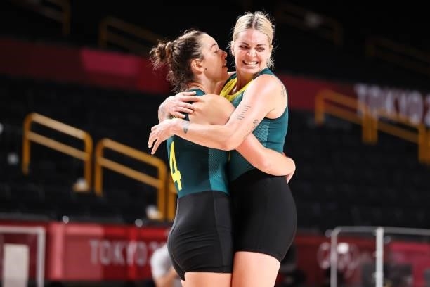Bec Allen of Team Australia and teammate Cayla George celebrate after defeating Puerto Rico in a Women's Basketball Preliminary Round Group C game on...