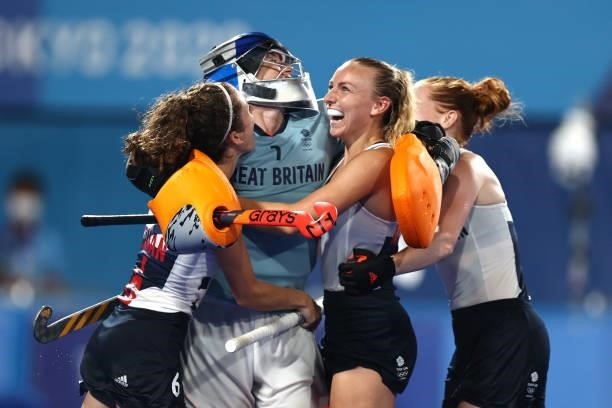 Anna-Frances Toman, Madeleine Claire Hinch, Hannah Martin and Sarah Louise Jones of Team Great Britain celebrate victory in the Women's Quarterfinal...