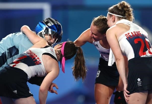 Madeleine Claire Hinch of Team Great Britain celebrates victory with teammates Laura Unsworth, Hollie Pearne-Webb and Giselle Ansley of Team Great...