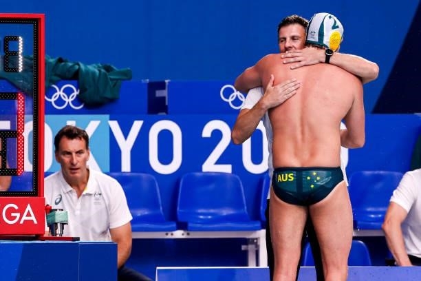 Head Coach Elvis Fatovic of Team Australia, Richard Campbell of Team Australia during the Tokyo 2020 Olympic Waterpolo Tournament Men match between...