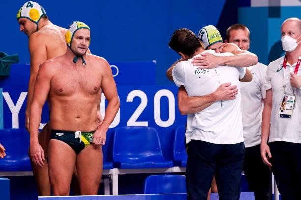 Head Coach Elvis Fatovic of Team Australia, Rhys Howden of Team Australia during the Tokyo 2020 Olympic Waterpolo Tournament Men match between Team...