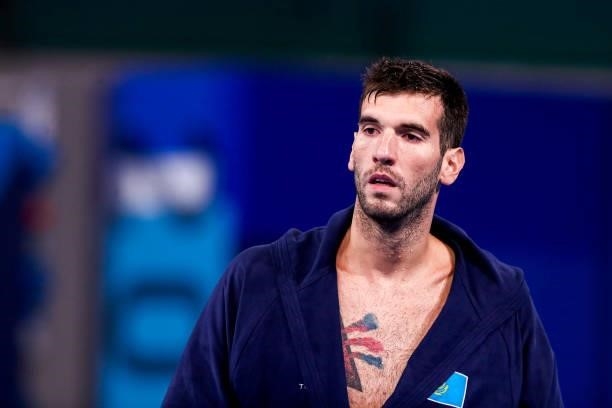 Srdan Vuksanovic of Kazakhstan received red card for applying vaseline on his skin during the Tokyo 2020 Olympic Waterpolo Tournament Men match...