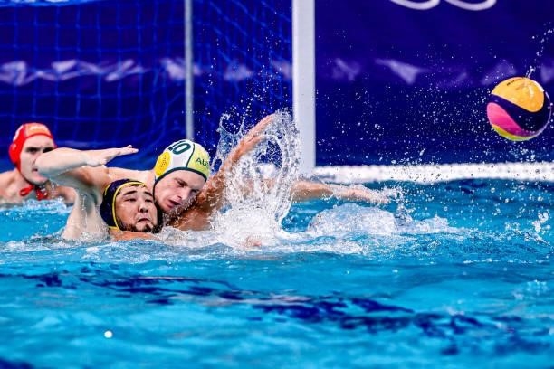 Altay Altayev of Kazakhstan, Timothy Putt of Australia during the Tokyo 2020 Olympic Waterpolo Tournament Men match between Team Australia and Team...