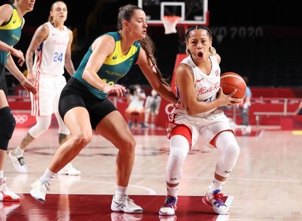 Dayshalee Salaman of Team Puerto Rico drives to the basket against Tess Lavey of Team Australia during the 2nd half of a Women's Basketball...